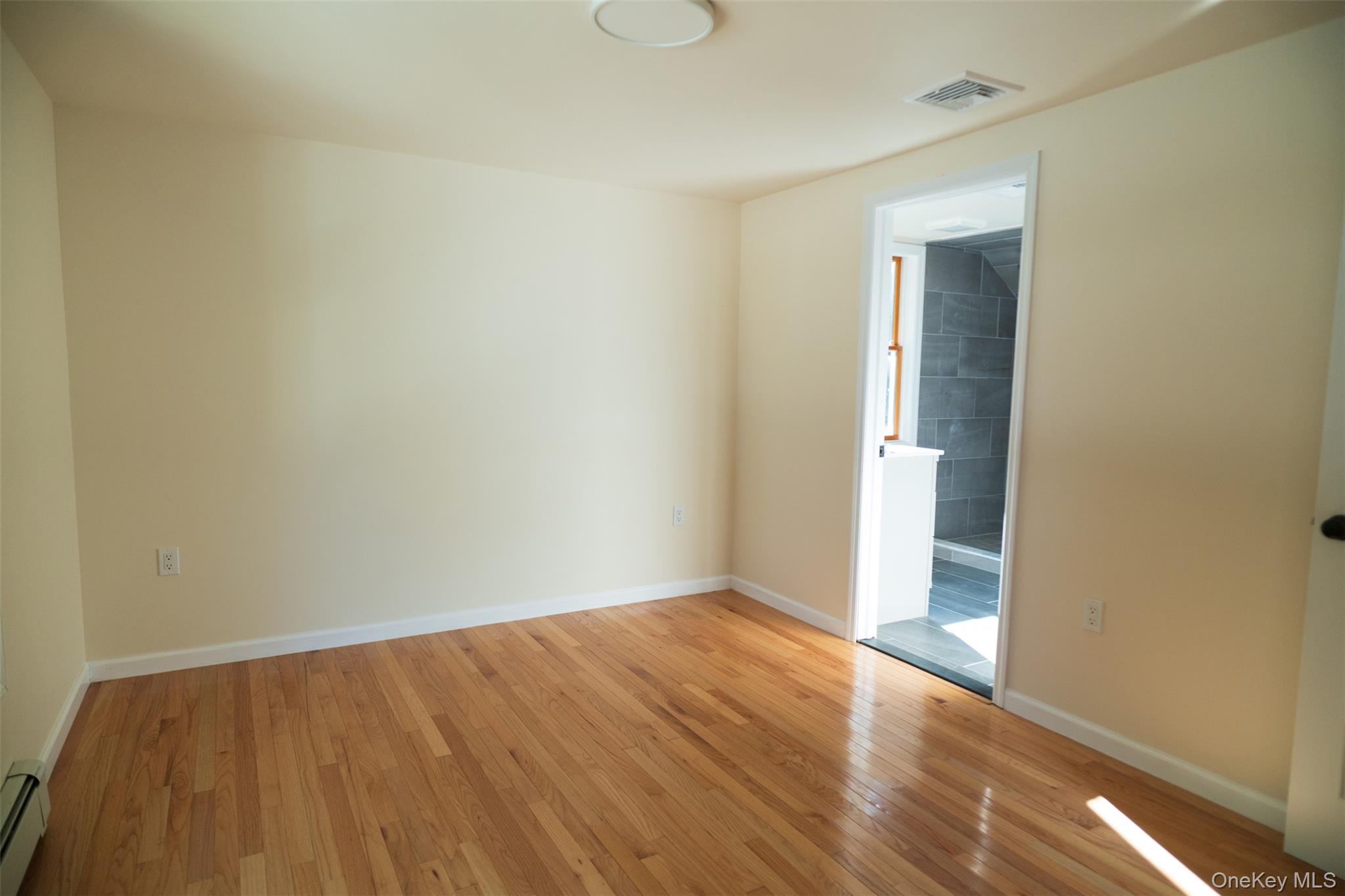 35 Rapalje Road Fishkill, NY 12524 - Photo 27 of 44 wooden floor in a hall with an empty room