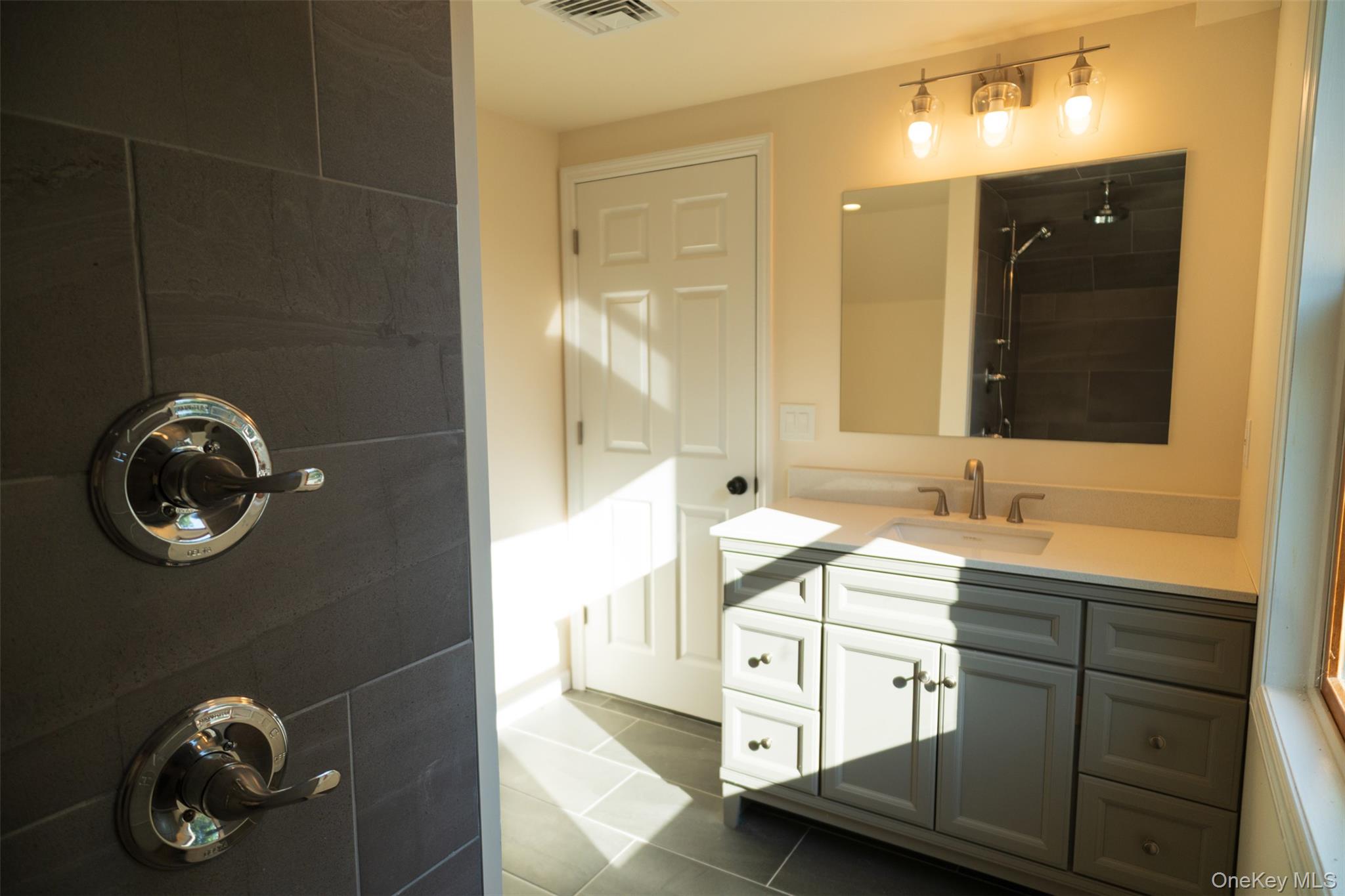 35 Rapalje Road Fishkill, NY 12524 - Photo 31 of 44 a bathroom with a sink and a mirror