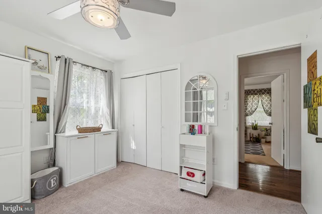 a room with window and cabinet