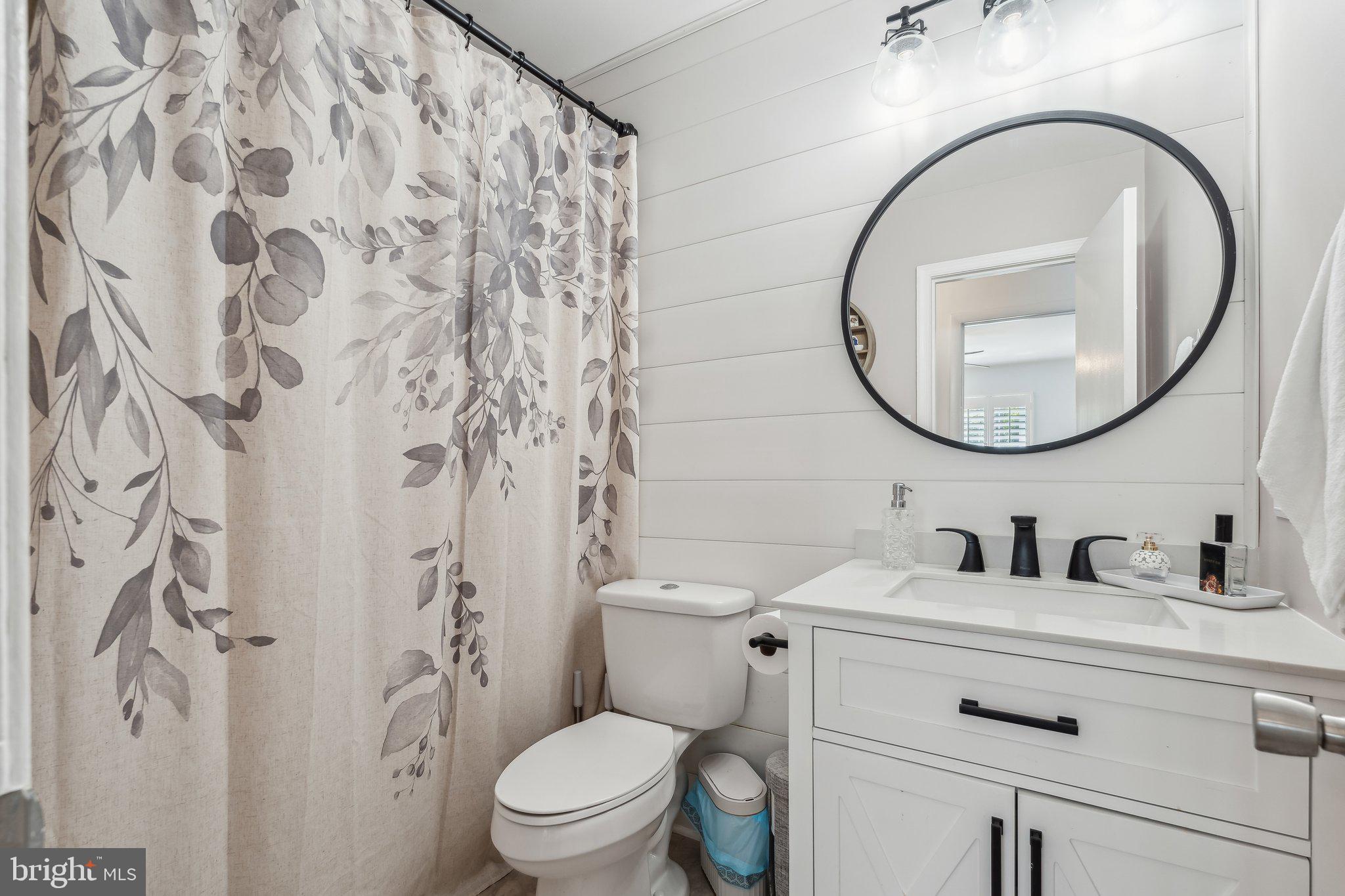 5232 Sumerduck Road Sumerduck, VA 22742 - Photo 17 of 40 a bathroom with a sink and a mirror