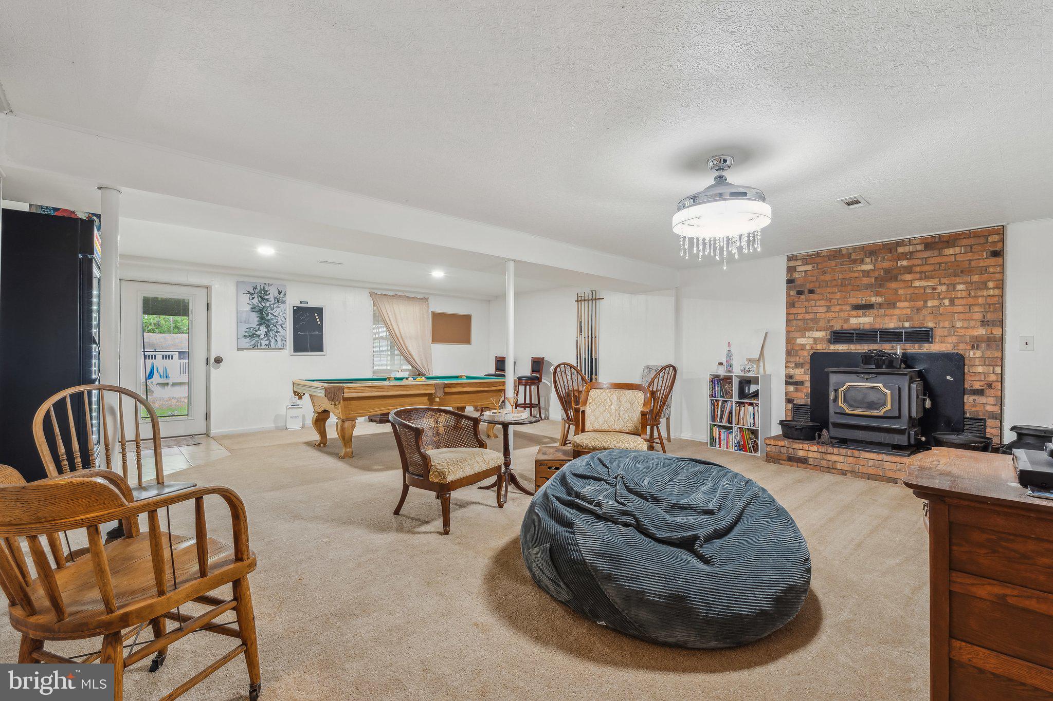 5232 Sumerduck Road Sumerduck, VA 22742 - Photo 20 of 40 a living room with furniture and a fireplace