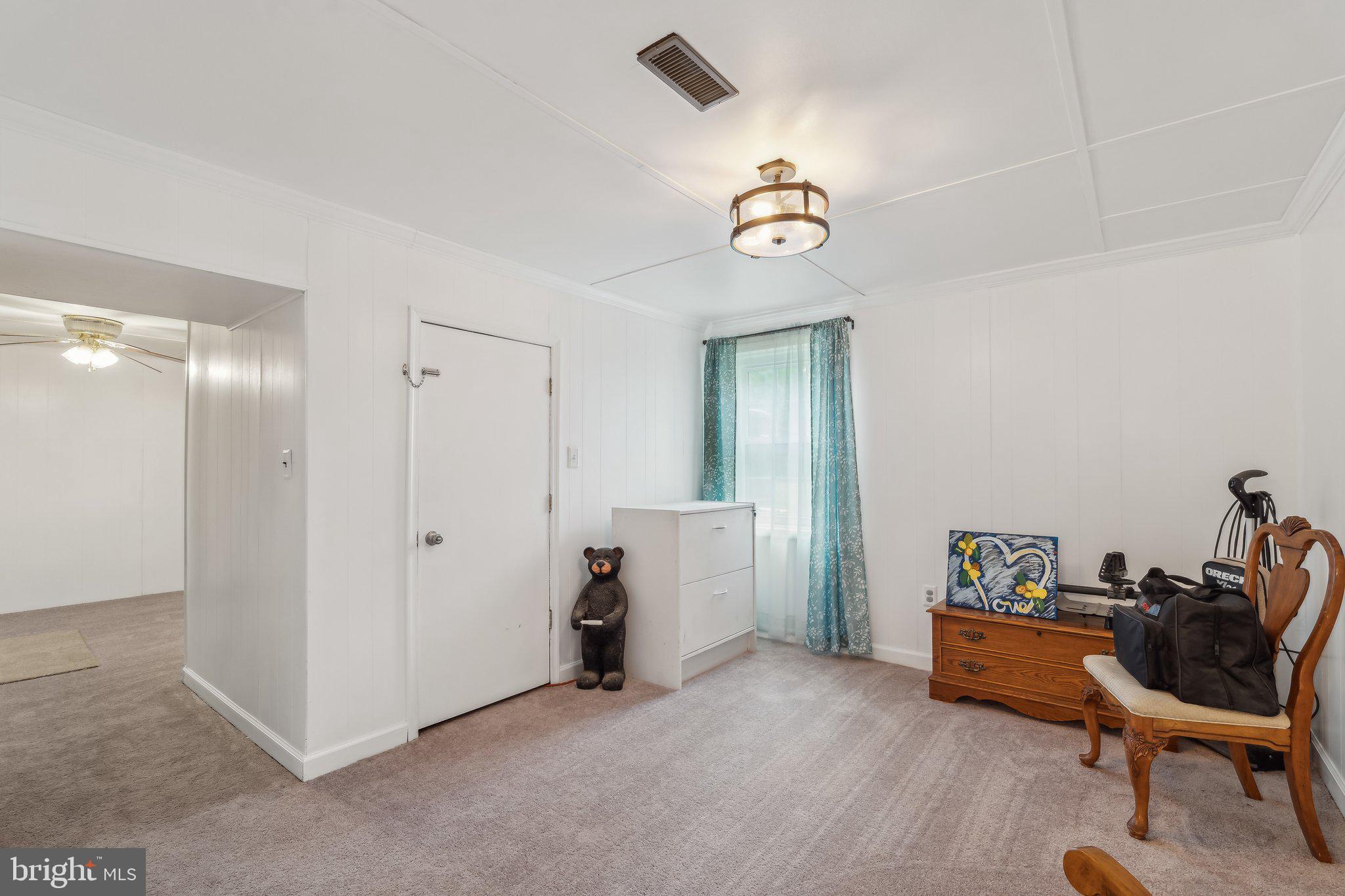5232 Sumerduck Road Sumerduck, VA 22742 - Photo 26 of 40 a view of a livingroom with furniture and a to ceiling window