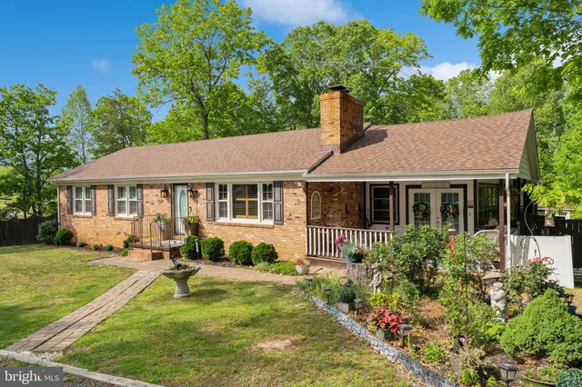 a front view of a house with swimming pool