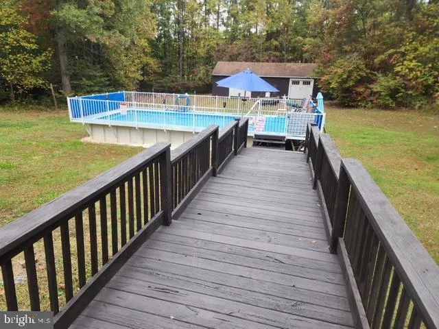 a view of street with parked cars