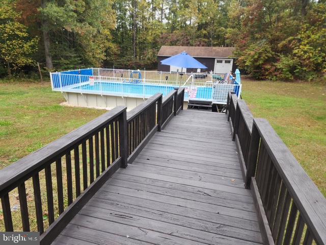 5232 Sumerduck Road Sumerduck, VA 22742 - Photo 33 of 40 a view of a balcony with wooden floor and lake view