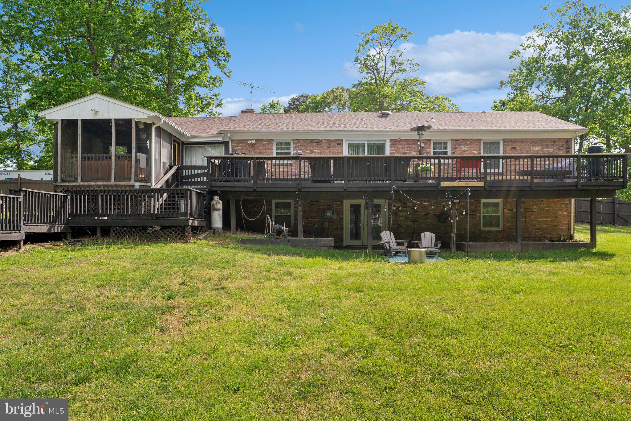 5232 Sumerduck Road Sumerduck, VA 22742 - Photo 38 of 40 a view of a house with a yard and sitting area