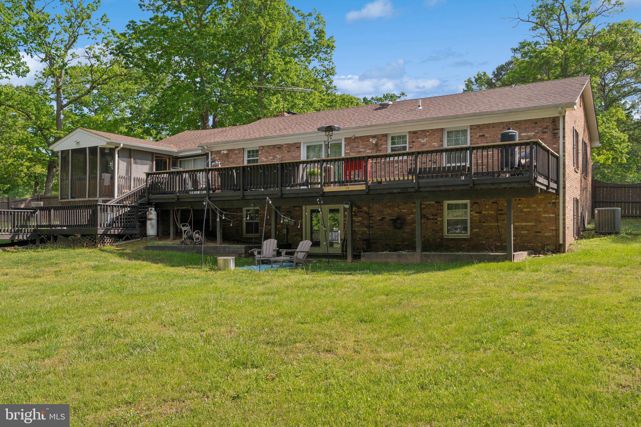 5232 Sumerduck Road Sumerduck, VA 22742 - Photo 39 of 40 a view of a house with a yard and sitting area