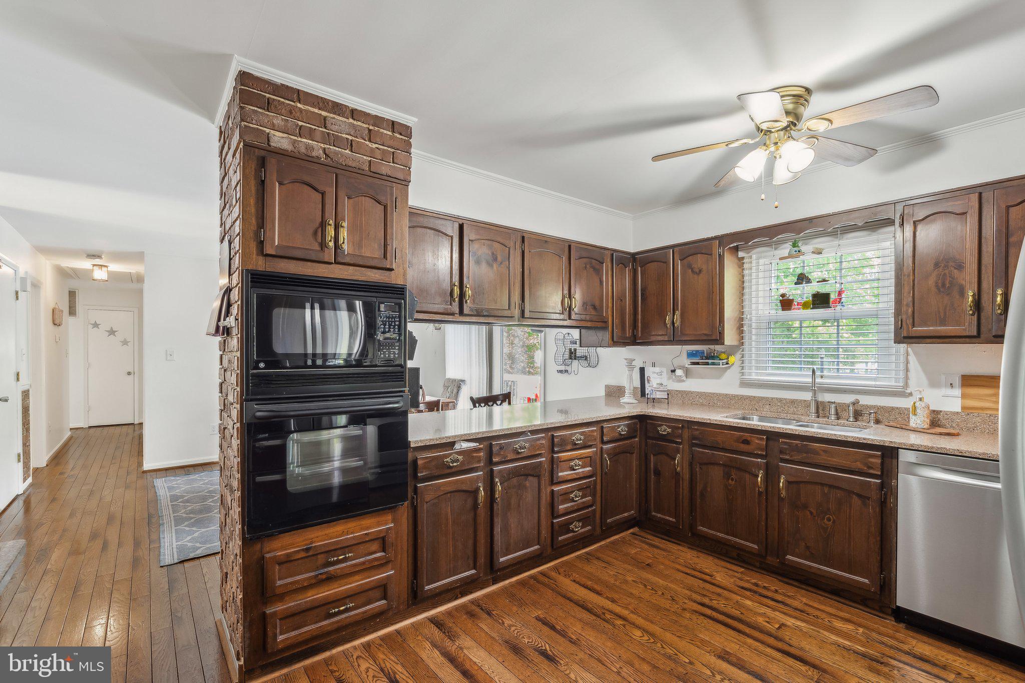 5232 Sumerduck Road Sumerduck, VA 22742 - Photo 6 of 40 a kitchen with stainless steel appliances granite countertop a sink and cabinets