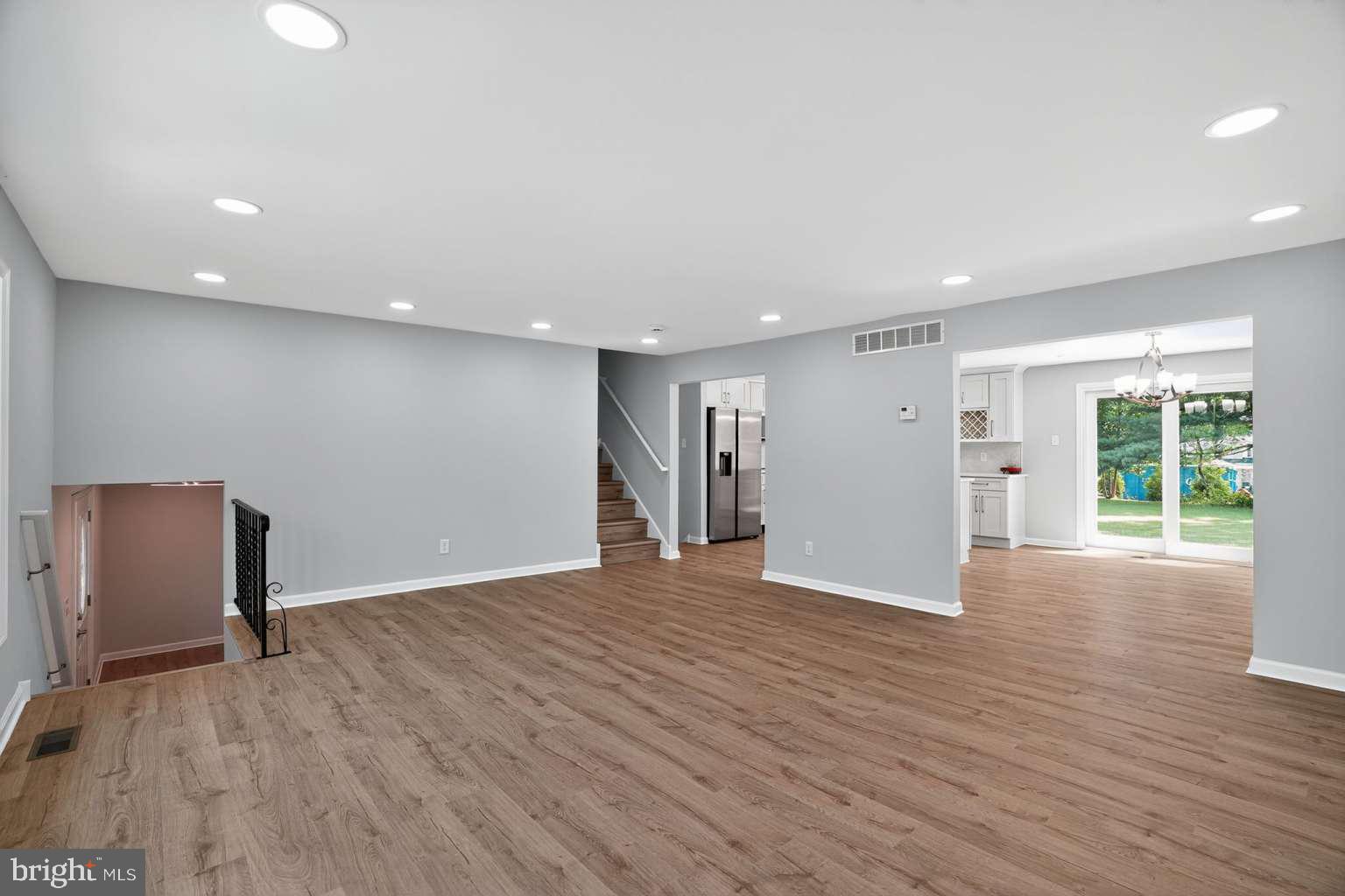 1841 Buck Road Feasterville-Trevose, PA 19053 - Photo 13 of 37 a view of an empty room with wooden floor and a window