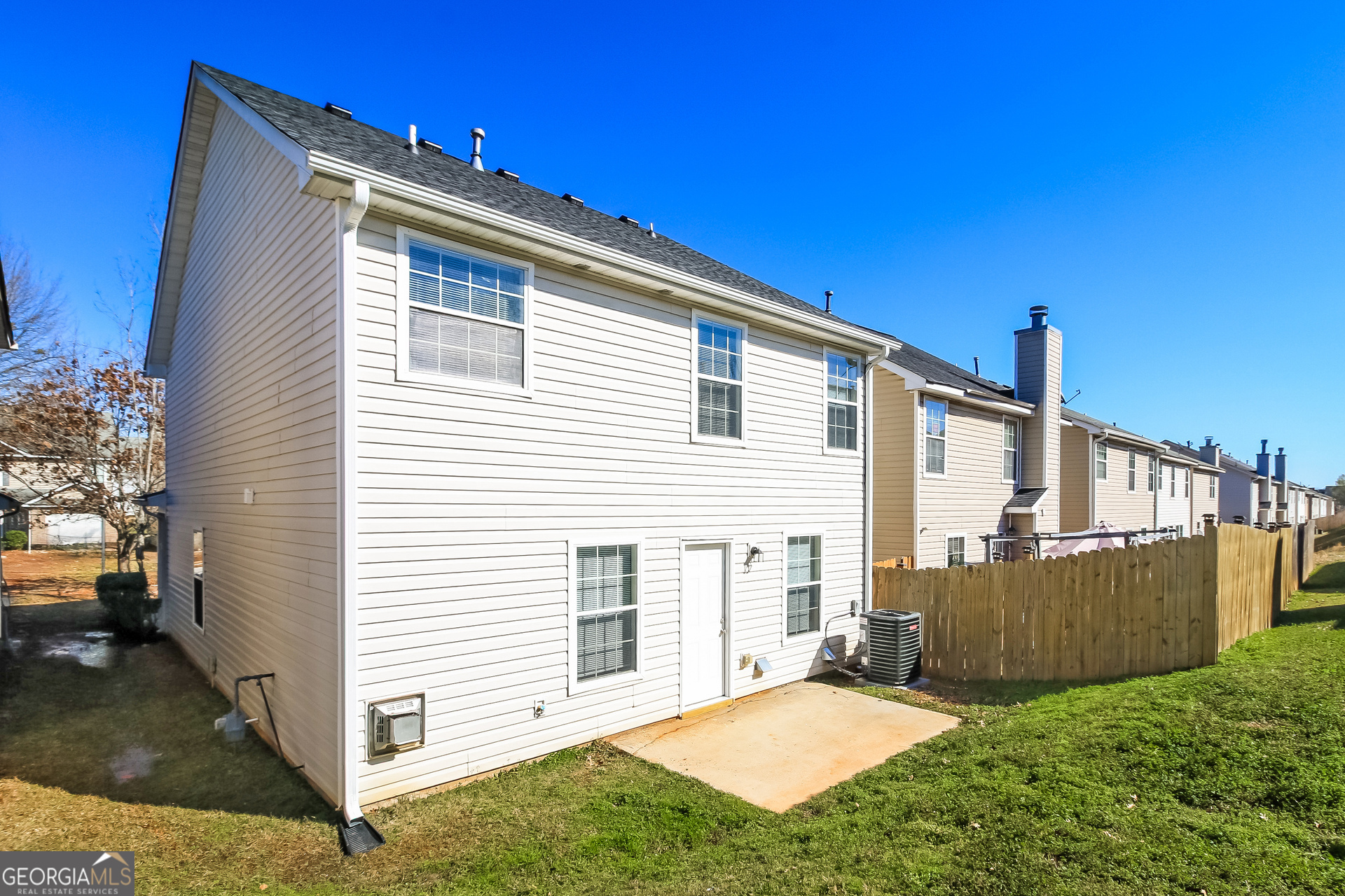 165 Colser Drive Covington, GA 30016 - Photo 14 of 17 a view of a house with backyard and sitting area