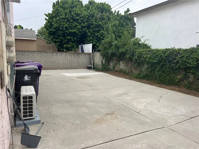 a view of backyard and entertaining space