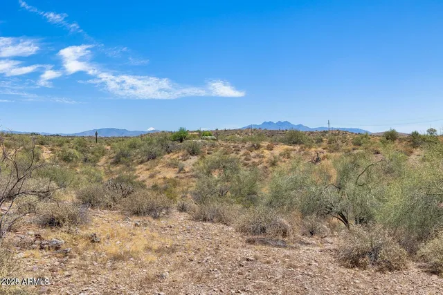 a view of mountain view with lots of trees