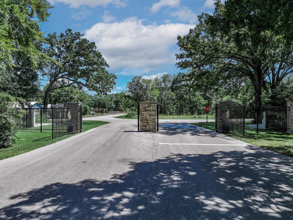 741 Inner Circle Tool, TX 75143 - Photo 18 of 24 a street view with large trees
