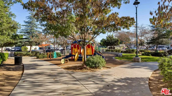 a view of a slide with sitting area