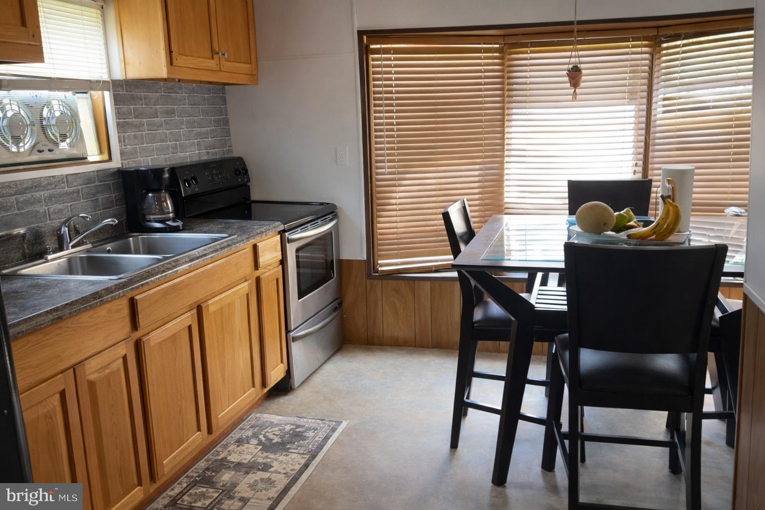700 Salem Road Etters, PA 17319 - Photo 4 of 11 a kitchen that has a cabinets wooden table and chairs