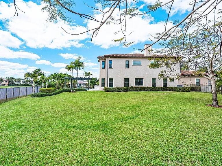 17511 Cadena Drive Boca Raton, FL 33496 - Photo 15 of 62 a view of a house with a big yard