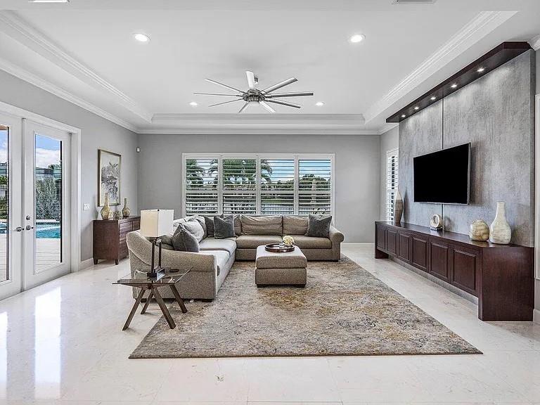 17511 Cadena Drive Boca Raton, FL 33496 - Photo 17 of 62 a living room with furniture and a flat screen tv