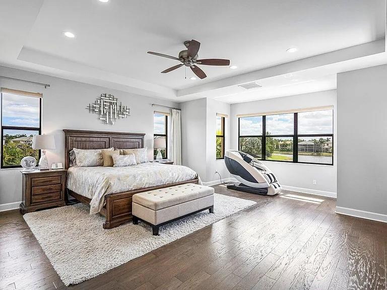 17511 Cadena Drive Boca Raton, FL 33496 - Photo 24 of 62 a bedroom with a bed and a window