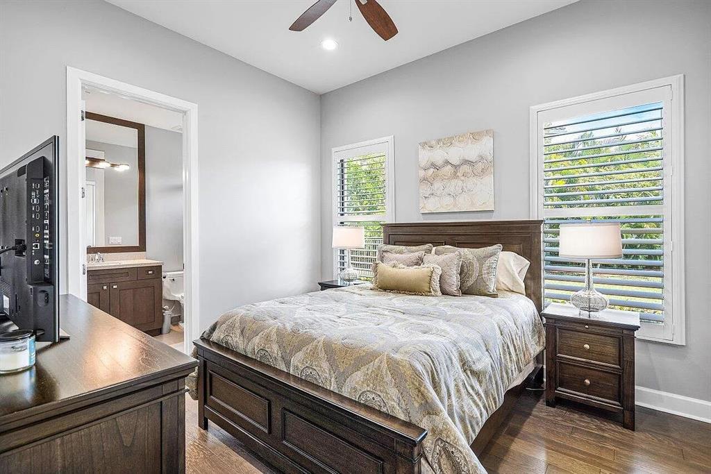 17511 Cadena Drive Boca Raton, FL 33496 - Photo 30 of 62 a bedroom with a bed and a night stand