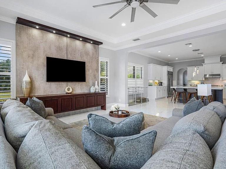 17511 Cadena Drive Boca Raton, FL 33496 - Photo 3 of 62 a living room with furniture and a flat screen tv