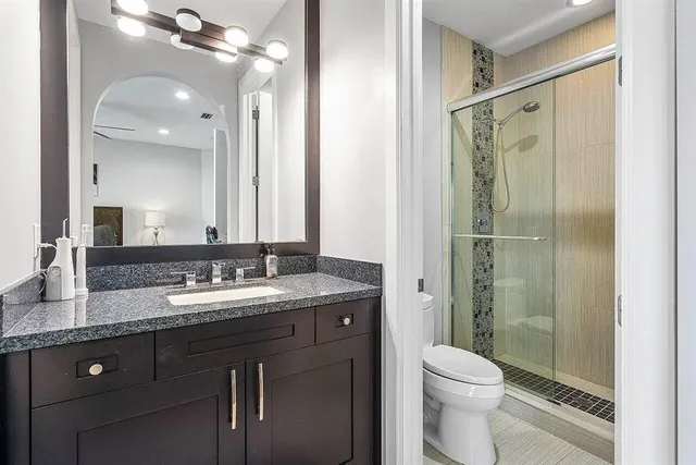 a bathroom with a sink and a toilet