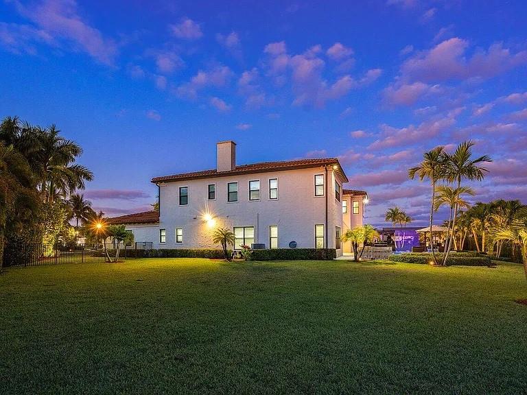 17511 Cadena Drive Boca Raton, FL 33496 - Photo 44 of 62 a view of a house with a big yard