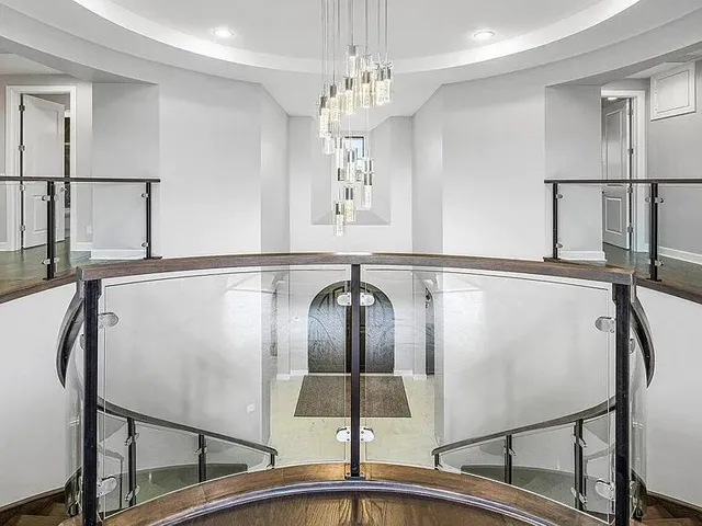 a kitchen with a sink and a refrigerator