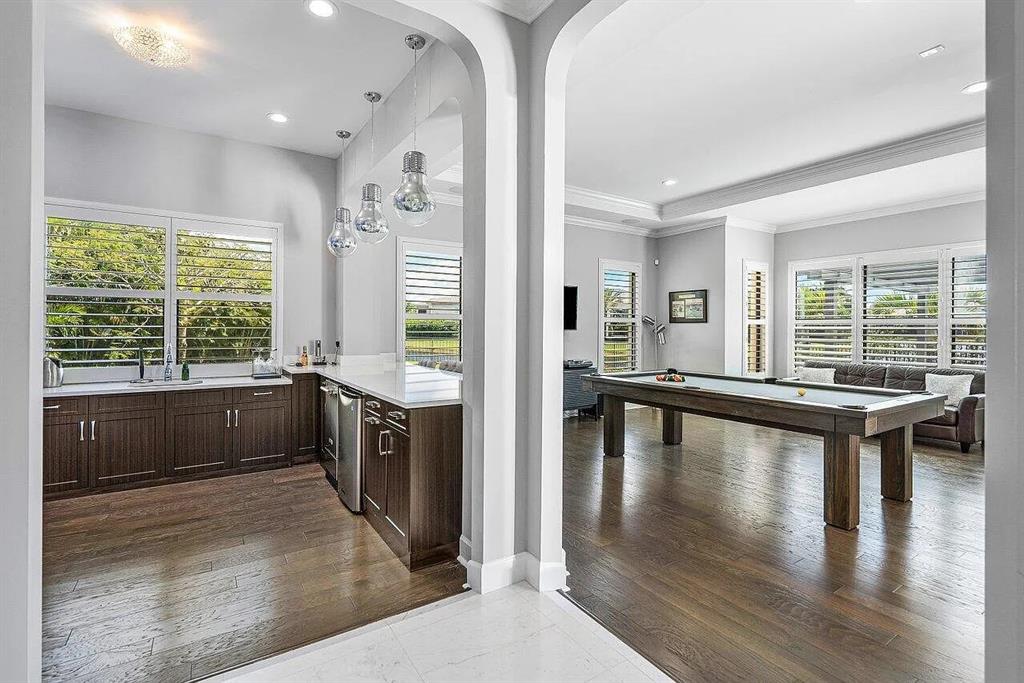 17511 Cadena Drive Boca Raton, FL 33496 - Photo 56 of 62 a kitchen with a large window appliances and cabinets