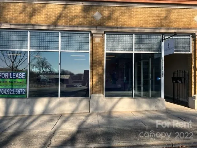 a view of backyard with tub