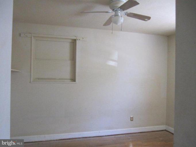 8615 Riggs Road Hyattsville, MD 20783 - Photo 7 of 7 a view of a small space with a fan