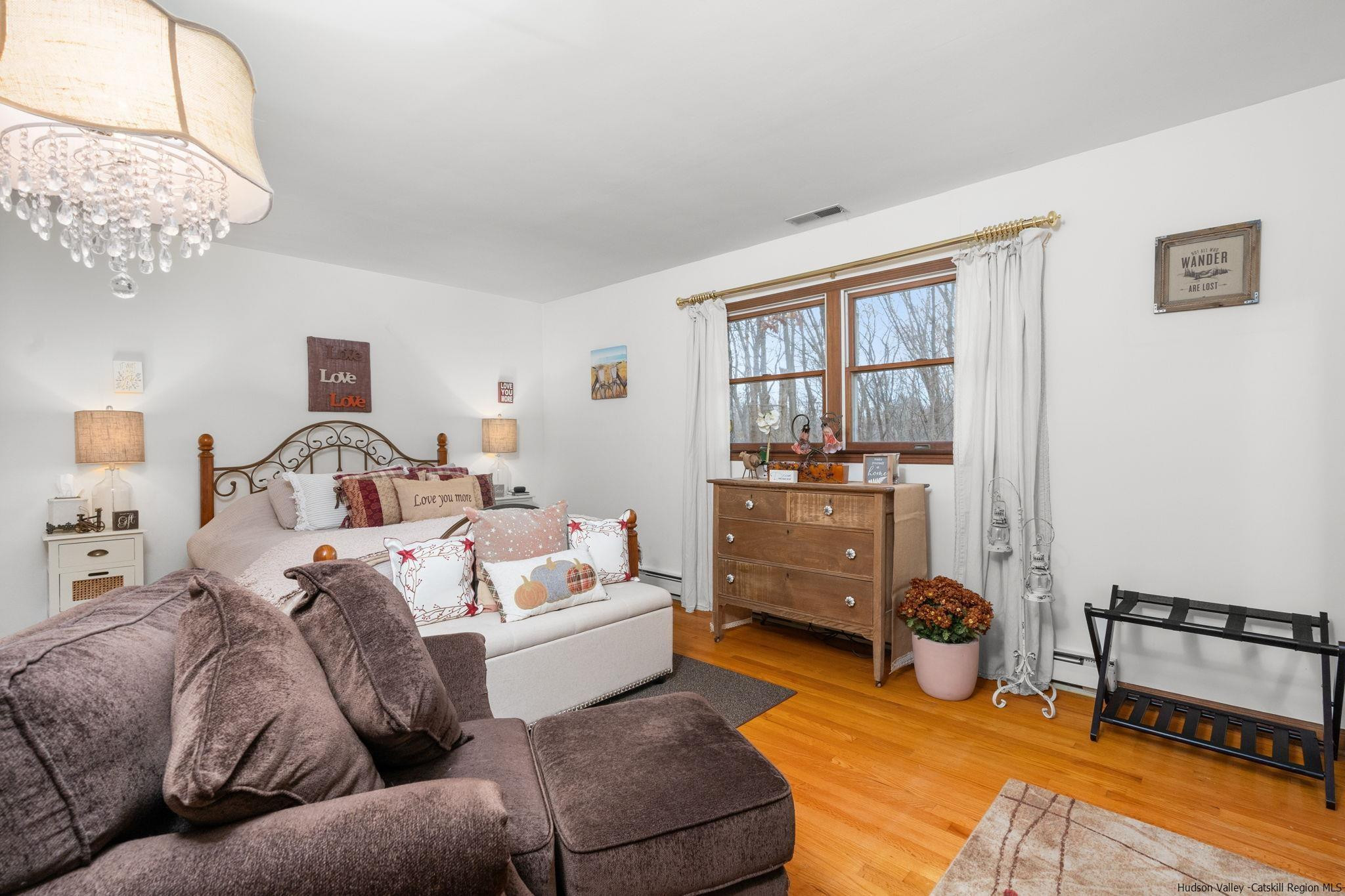 154 Mountain View Road Tillson, NY 12486 - Photo 11 of 25 a living room with furniture and a flat screen tv