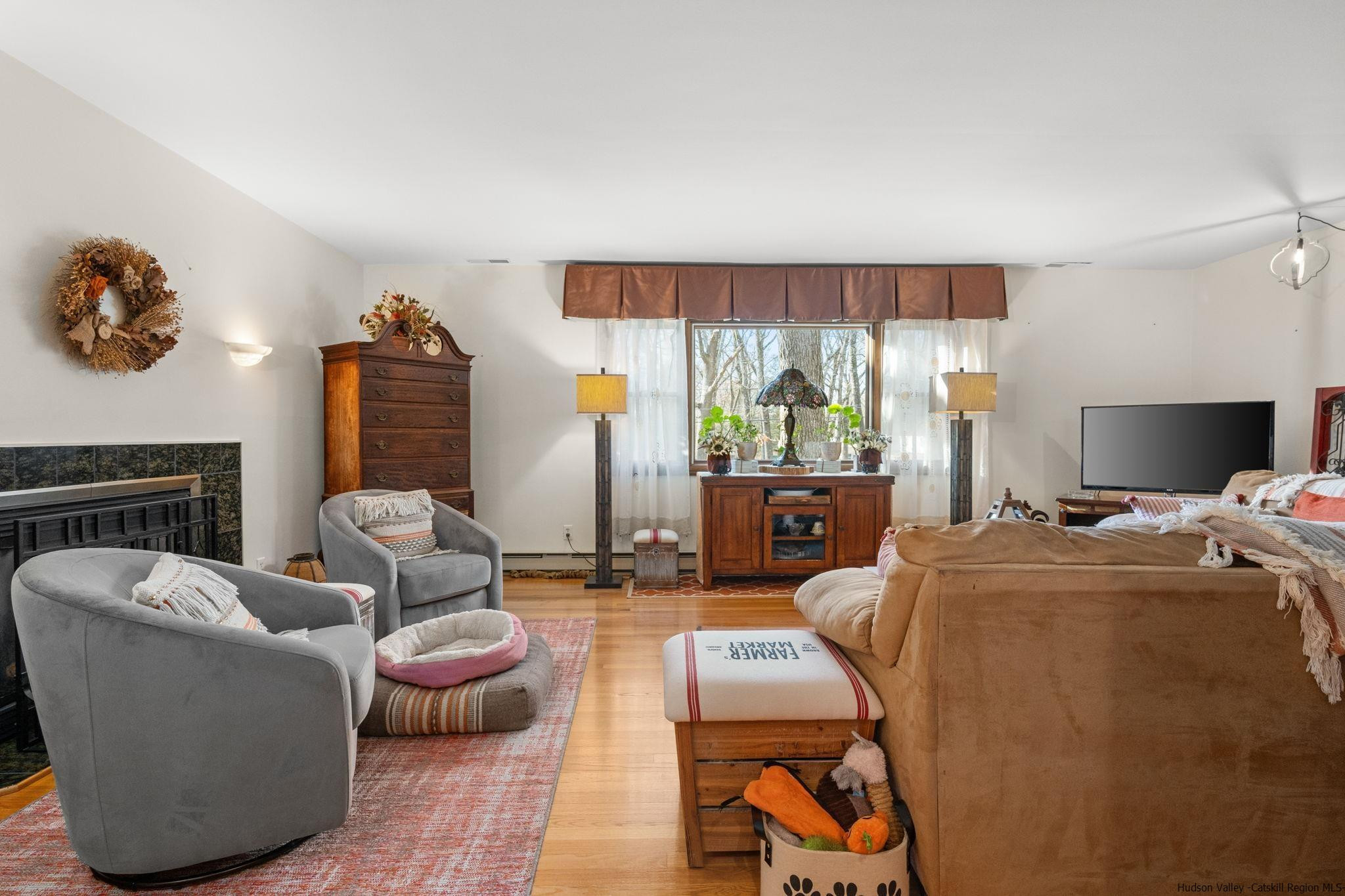 154 Mountain View Road Tillson, NY 12486 - Photo 4 of 25 a living room with furniture and a large window