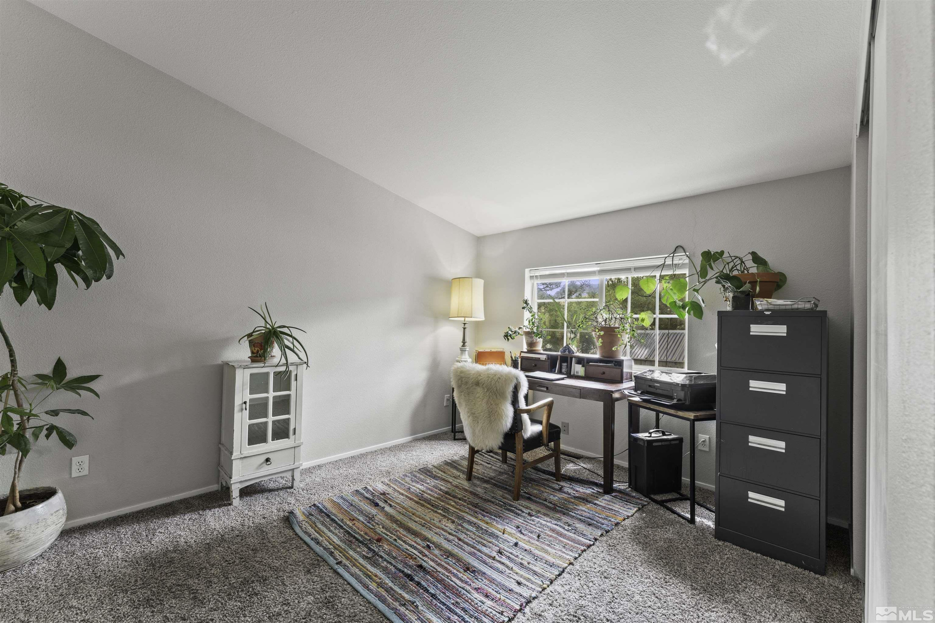 5158 Denali Way Reno, NV 89506 - Photo 12 of 24 a view of a workspace with furniture and a window