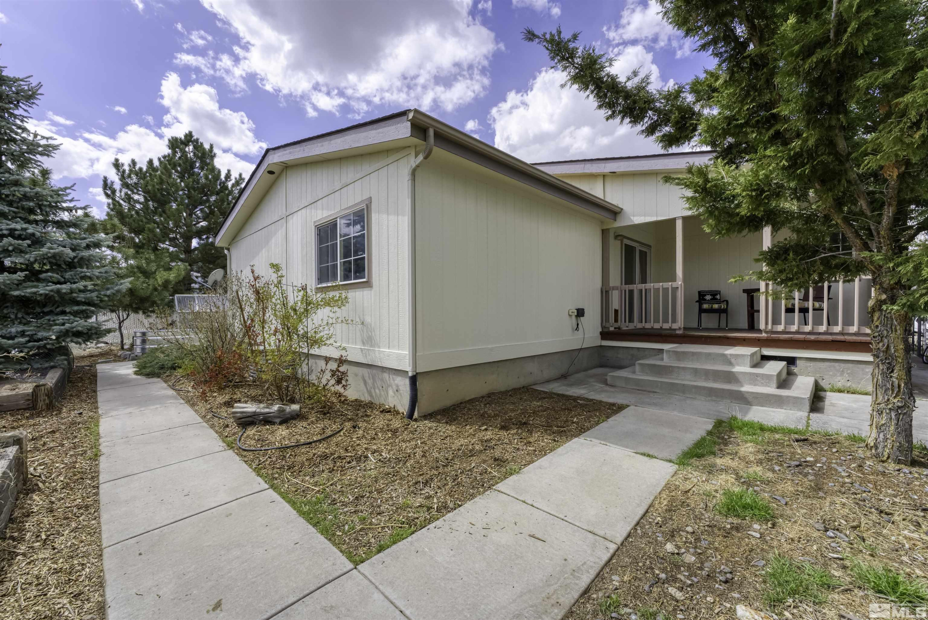 5158 Denali Way Reno, NV 89506 - Photo 20 of 24 a front view of a house with garden