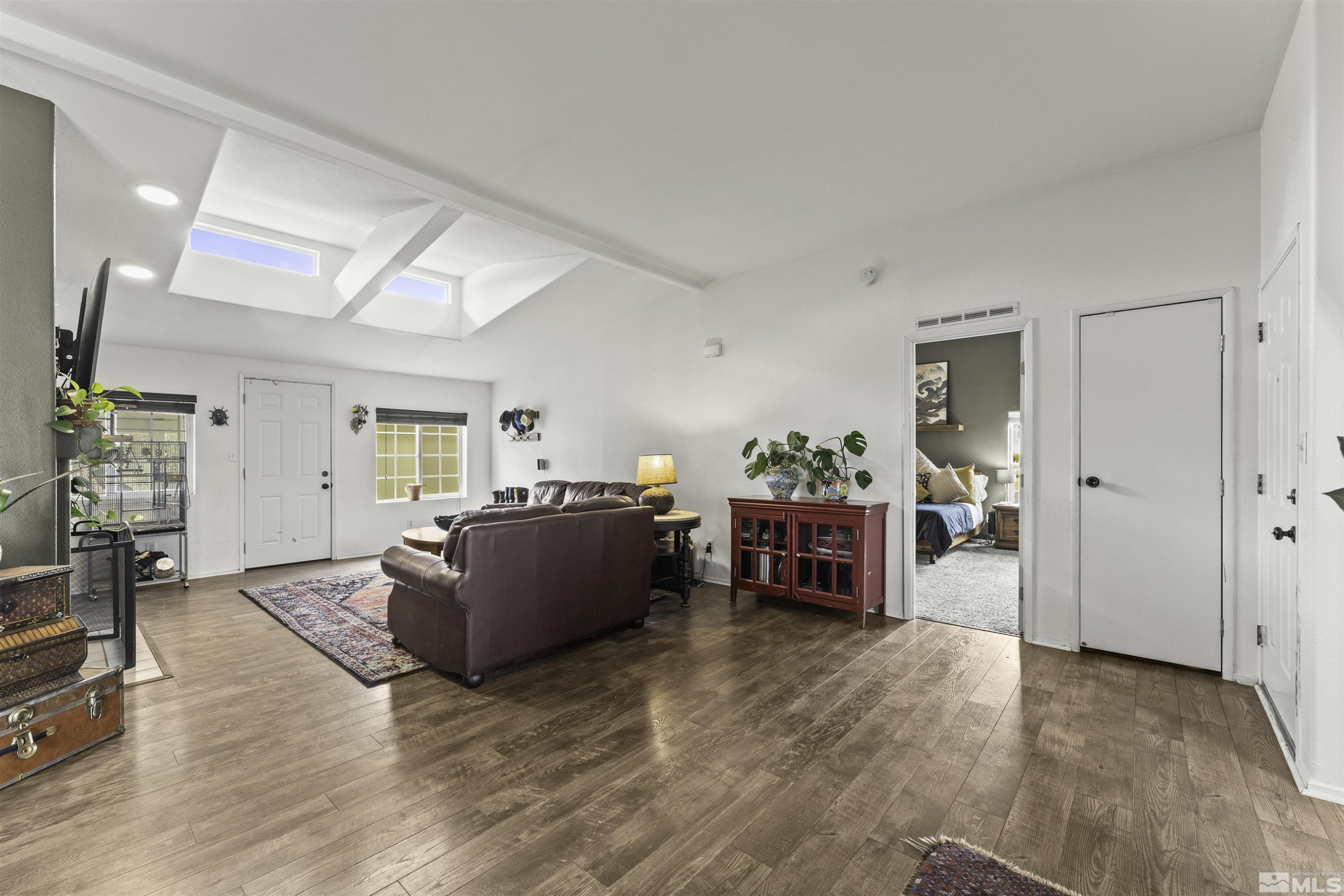 5158 Denali Way Reno, NV 89506 - Photo 4 of 24 a living room with furniture and a wooden floor