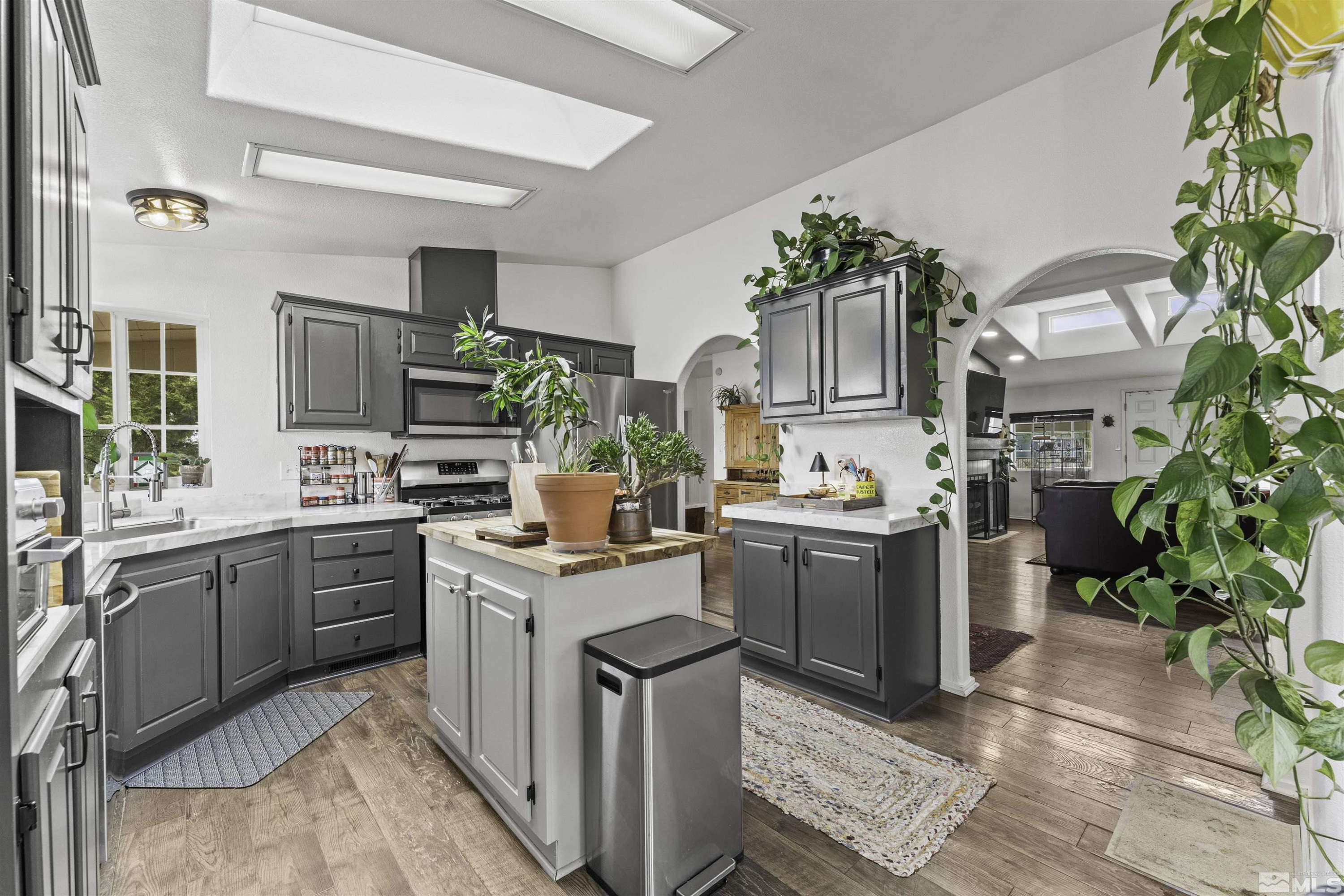 5158 Denali Way Reno, NV 89506 - Photo 7 of 24 a kitchen with a sink stove and refrigerator
