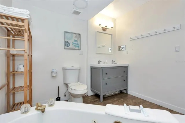 a view of a balcony with chairs