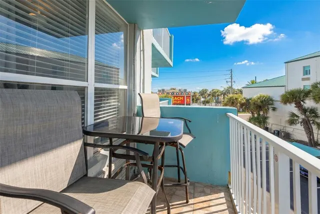a view of an entryway and livingroom