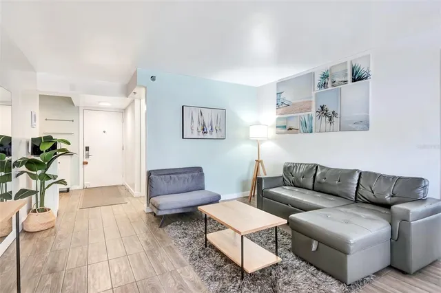 a living room with furniture and a couch