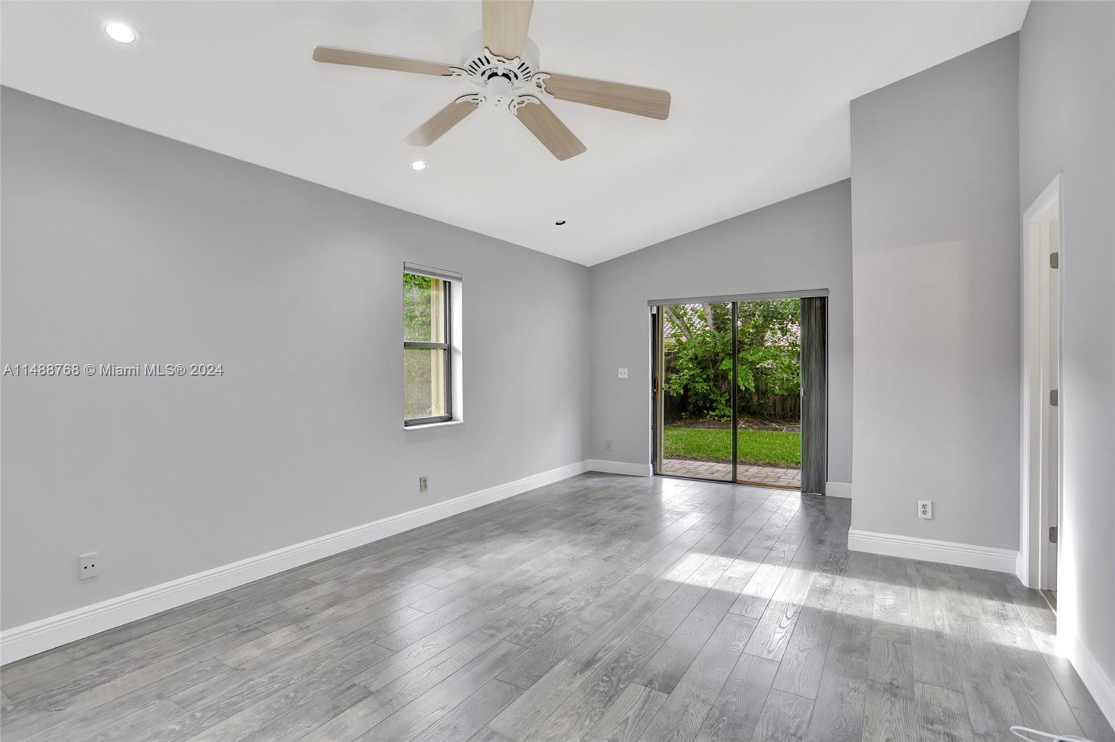 9641 Ridgeside Court Davie, FL 33328 - Photo 13 of 47 a view of an empty room with a window
