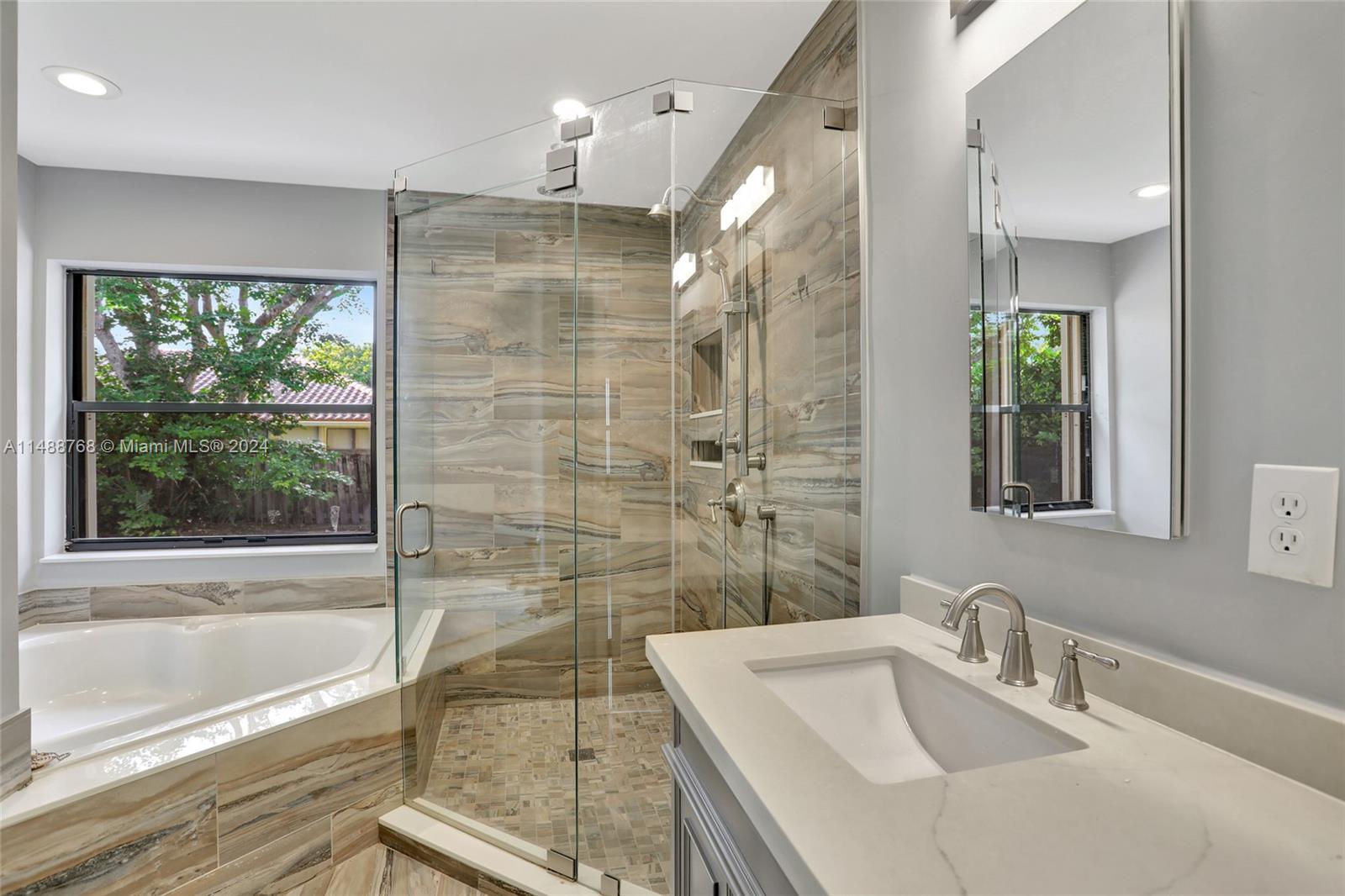 9641 Ridgeside Court Davie, FL 33328 - Photo 17 of 47 a bathroom with a sink and a mirror