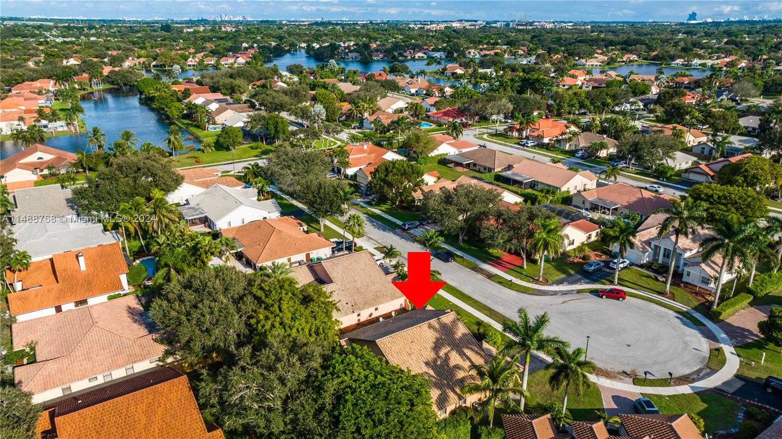 9641 Ridgeside Court Davie, FL 33328 - Photo 2 of 47 an aerial view of residential houses with outdoor space