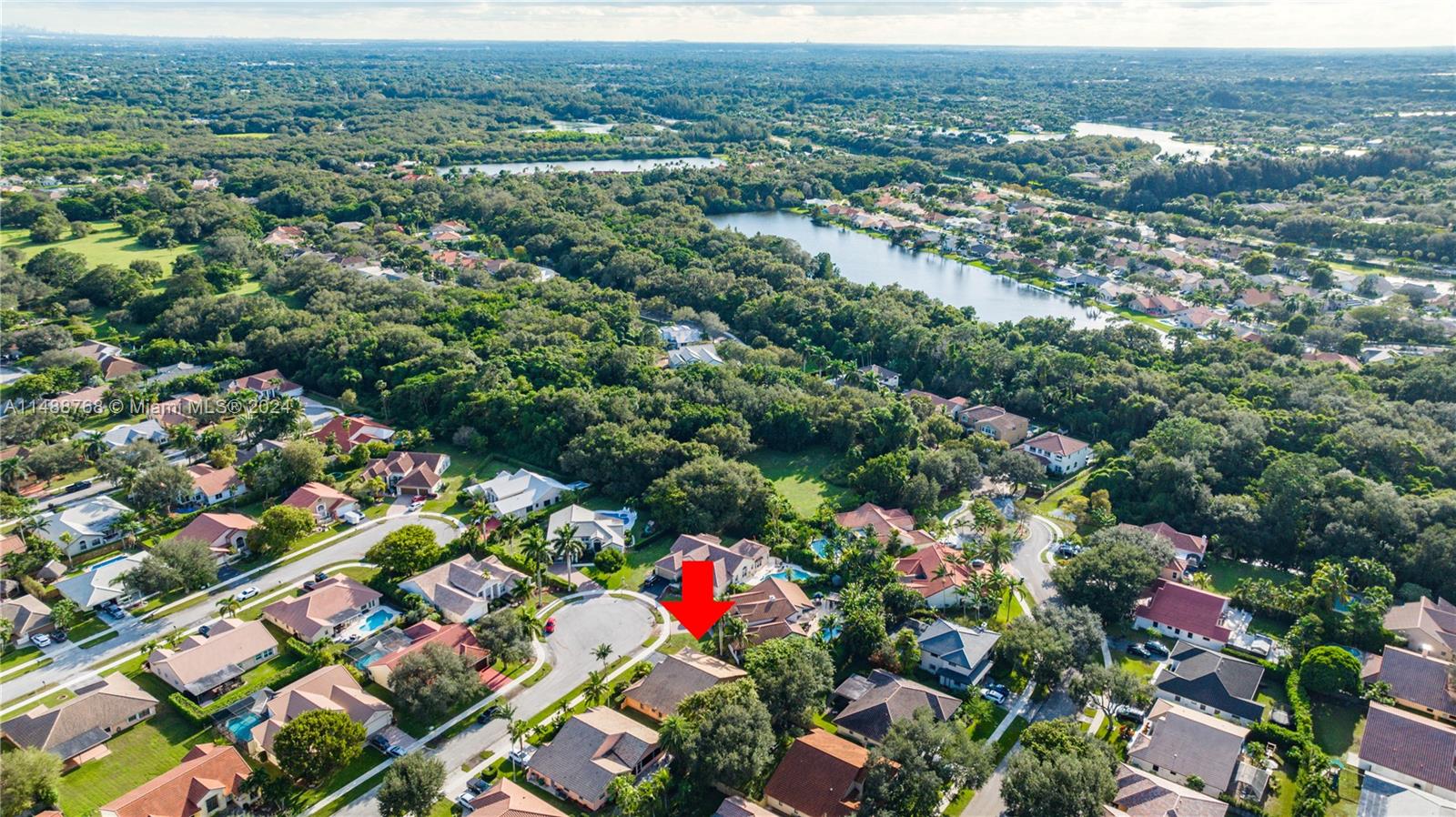 9641 Ridgeside Court Davie, FL 33328 - Photo 3 of 47 an aerial view of residential houses with outdoor space and trees