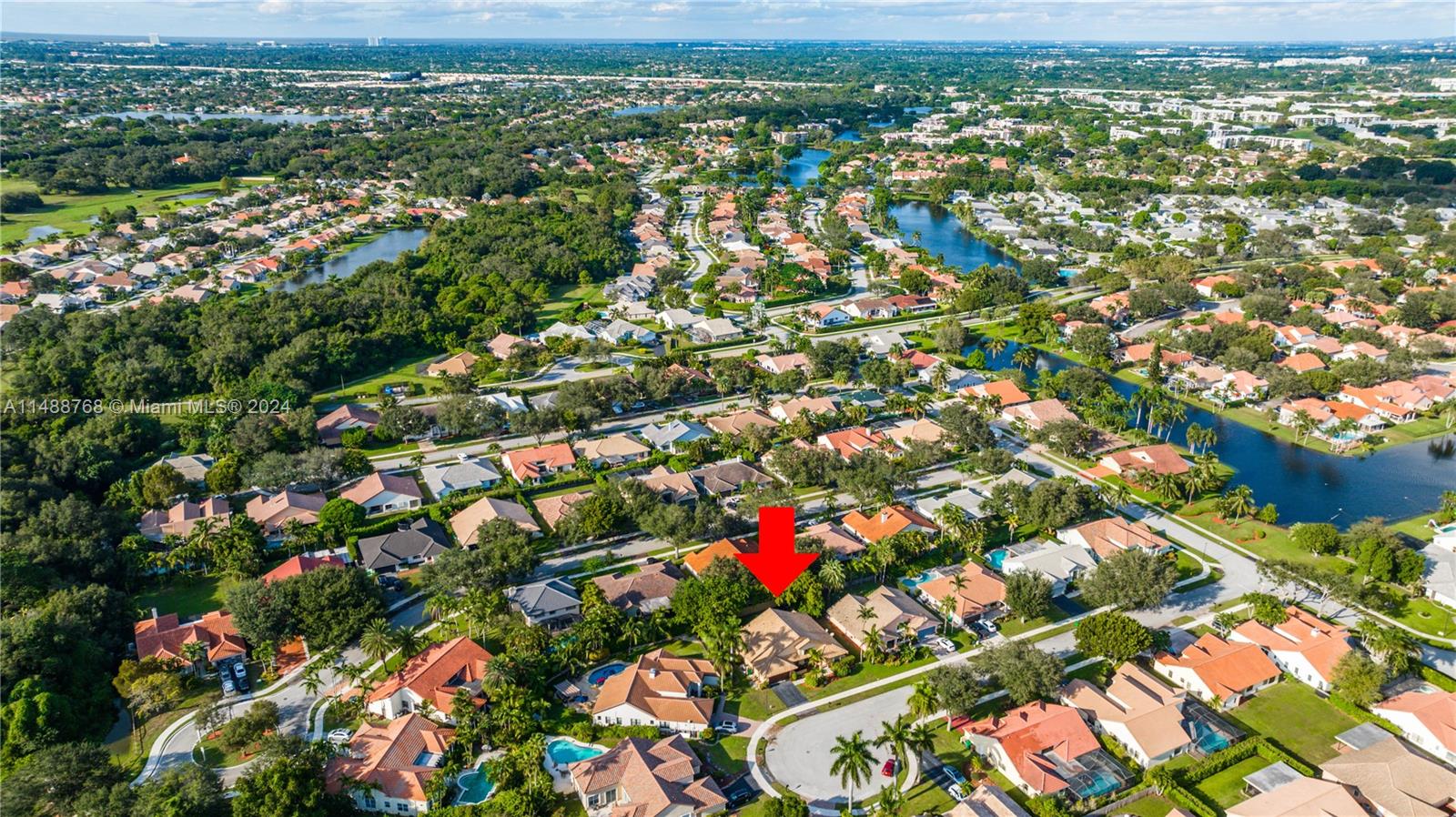 9641 Ridgeside Court Davie, FL 33328 - Photo 35 of 47 an aerial view of city and lake