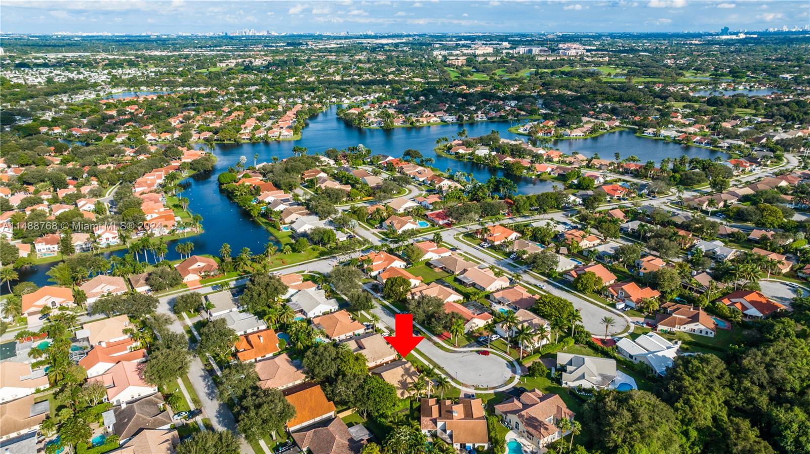 9641 Ridgeside Court Davie, FL 33328 - Photo 36 of 47 an aerial view of residential houses with outdoor space and trees
