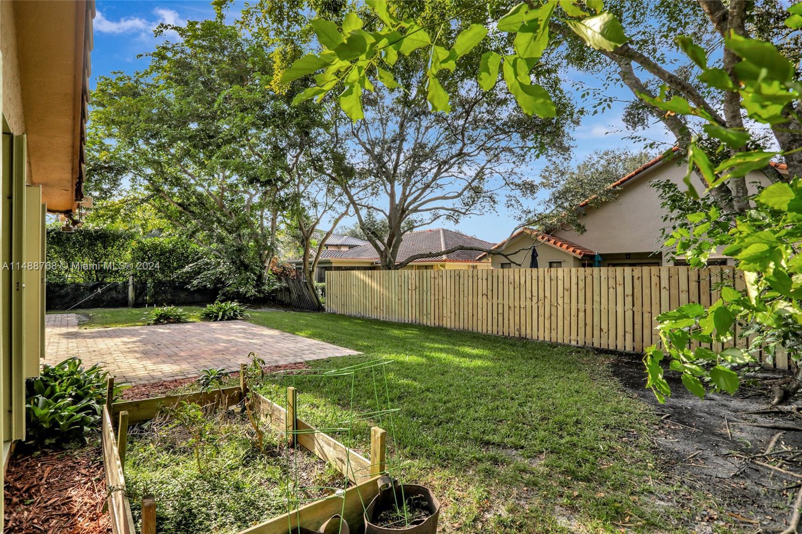 9641 Ridgeside Court Davie, FL 33328 - Photo 40 of 47 a view of a backyard