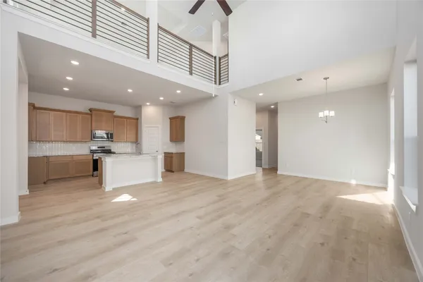 a kitchen with a sink cabinets and window