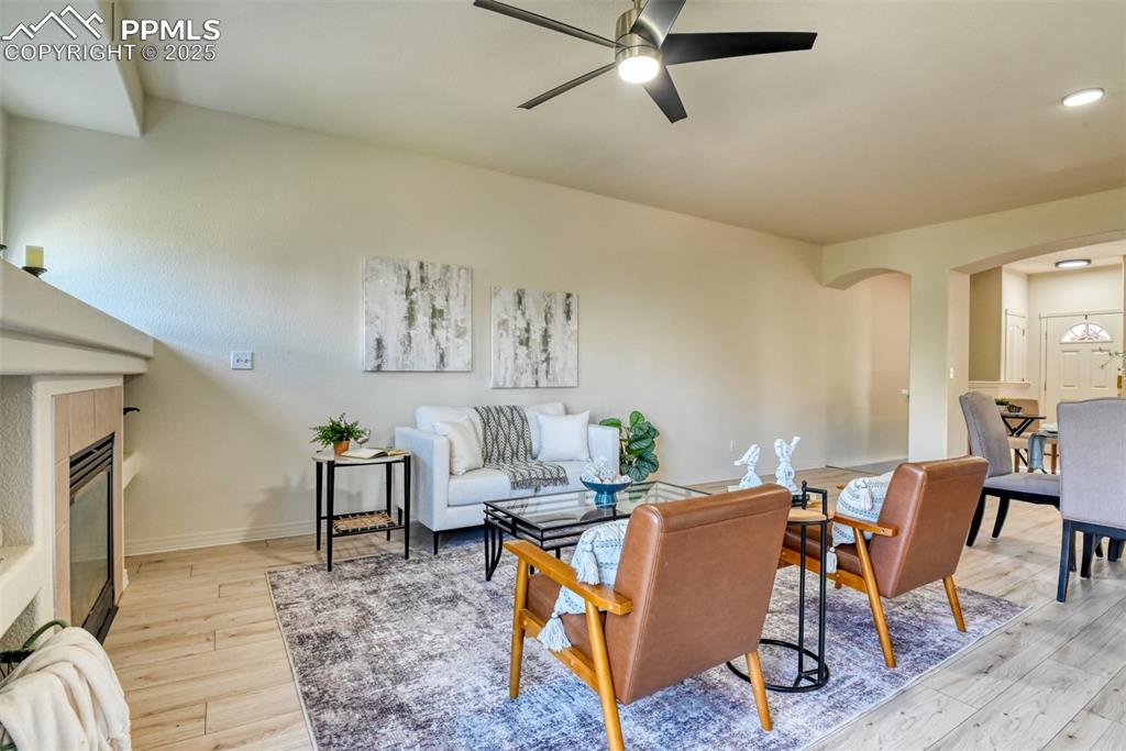 1431 Madison Ridge Heights, Unit C Colorado Springs, CO 80904 - Photo 11 of 44 a living room with furniture and a window