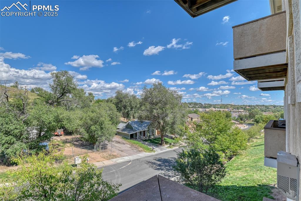 1431 Madison Ridge Heights, Unit C Colorado Springs, CO 80904 - Photo 14 of 44 a view of a yard