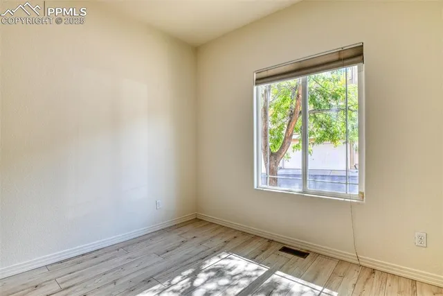 a view of an empty room and window